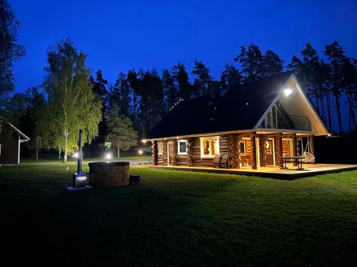 Mulgi Parish Ski Chalet | Explore Mäeküla Järve Palkmaja: Oceanfront Paradise Awaits