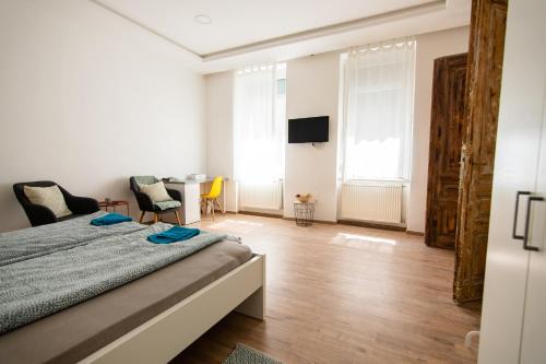 Szeged Apartment | Mérey Harmónia Apartman by Mital