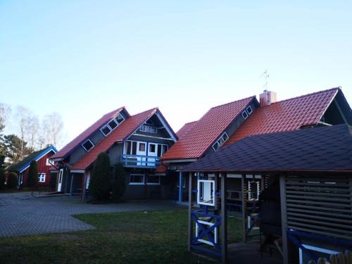 Neringa House | Family-Friendly Retreat at Mūsų kiemas with Kitchen Access