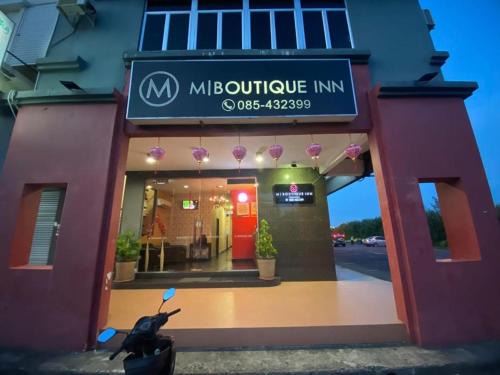 Lutong Hotel | Discover M Boutique Inn: Family-Friendly with Breakfast Included
