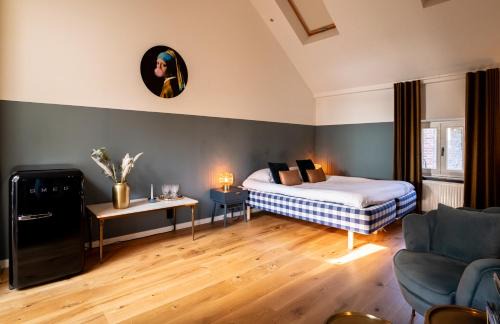 Lanaken Apartment | Eco-Friendly Maas Suites: Breakfast & Hot Tub Await in Maastricht