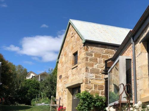 Hobart Central Business District Apartment | Family-Friendly Retreat at Macquarie Street Stable, 4-Star