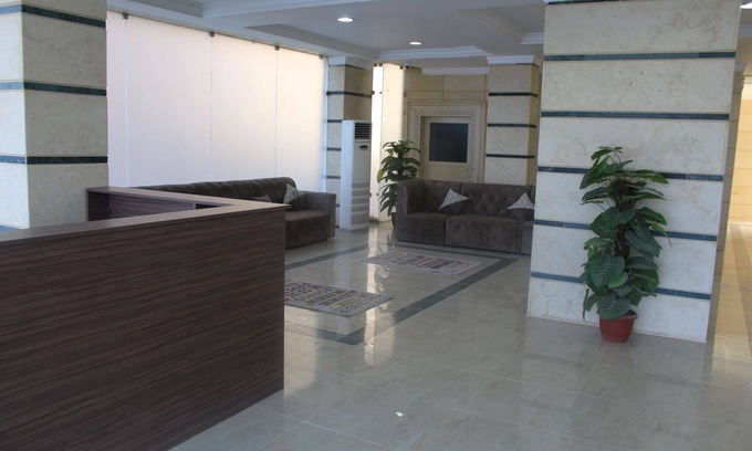 Kuwait City Apartment | Inviting Magic Suite Alraqi: Family-Friendly with Kitchen