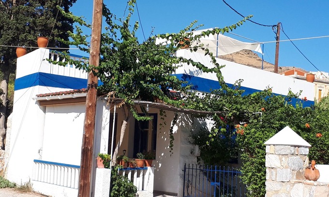 Posidonia House | Enchanting Syros: Oceanfront Bliss with Pool & Breakfast