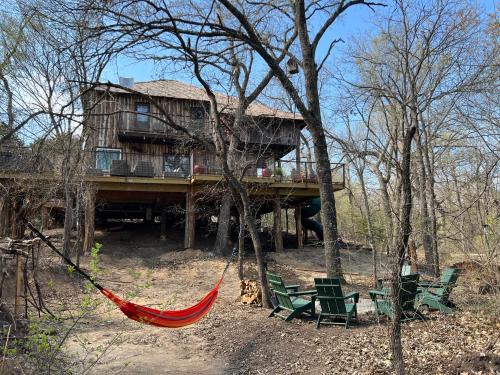 Dennis Ski Chalet | Enchanting Treehouse Escape with River Access and Petting Zoo