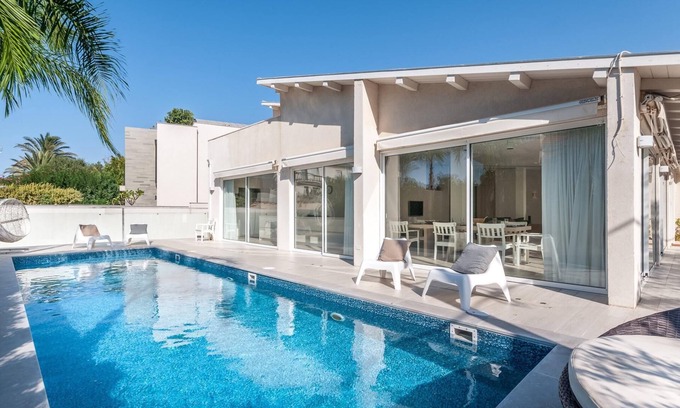 Herzliya Pituach Villa | Enchanting Villa Steps from the Beach with Heated Pool