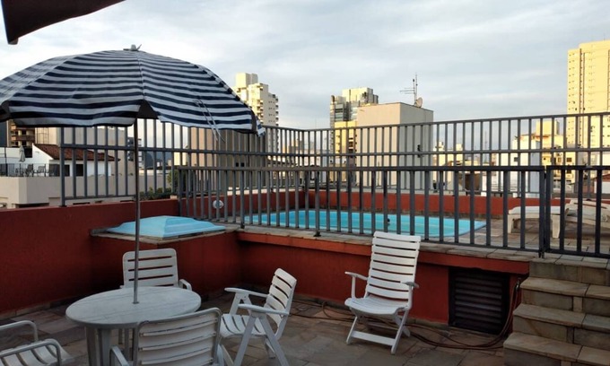 Enseada Apartment | Elegant Duplex Penthouse Steps from the Beach with Pool