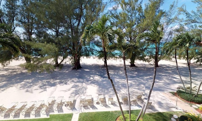 Seven Mile Beach Condo | Unparalleled Ocean Views from Elegant 4BR Penthouse Retreat