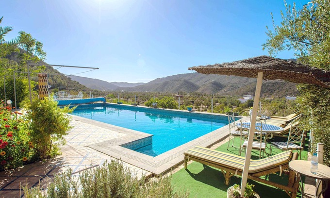 Aqesri House | Scenic Suite with Panoramic Mountain Views & Pool Access