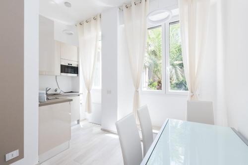 Tricolore Apartment | Magnolia Apartments: Stylish Stay Near Visconti Duomo