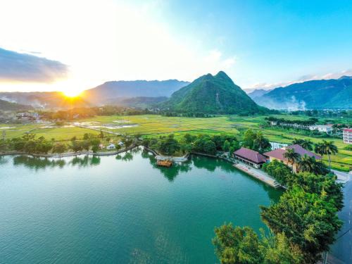 Chieng Chau Cabin | Relax at Mai Chau Lodge: Poolside Retreat with Ocean Views