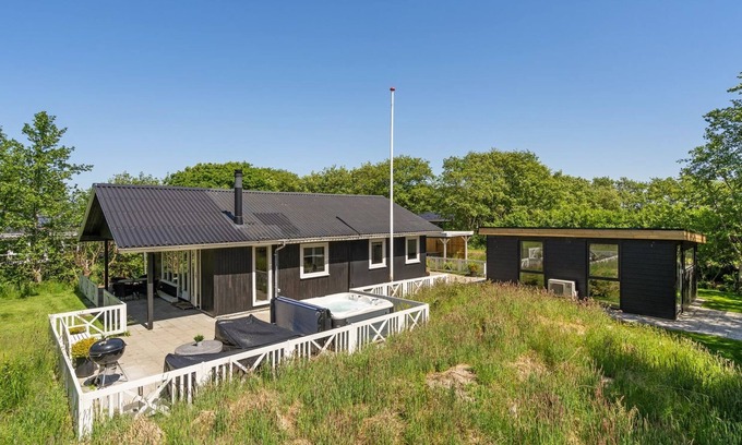 Rindby Strand House | Relax at Maik: Oceanfront Getaway with Spa & Hot Tub