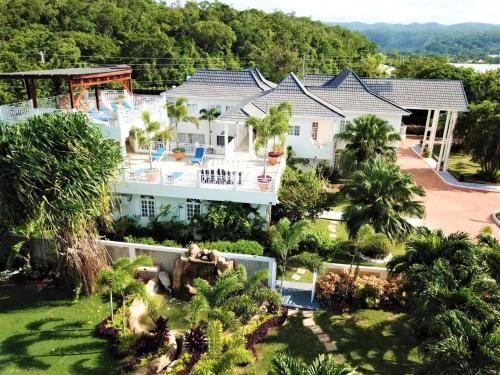Rio Bueno Villa | Indulge at Mais Oui Tennis and Spa Villa with Pool & Hot Tub