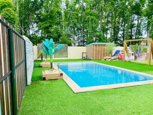 Mios Villa | Inviting Maison with Heated Pool and Child-Friendly Amenities