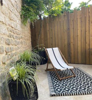 Les Veneurs House | Prime City Center Retreat with Inviting Outdoor Space