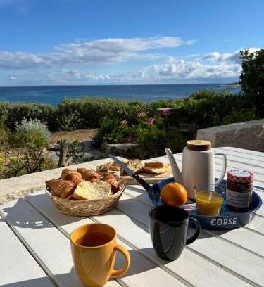 Marine de Saint Ambroggio House | Oceanfront Retreat: Maison les pieds dans l'eau, 4-Star Stay