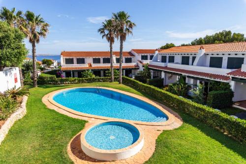 Arenal d'en Castell House | Experience Family-Friendly Comfort at Maison Menorca