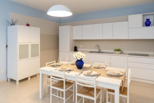 Trani Apartment | Discover Maison & Suite - Attico Blu: 4-Star Family Retreat