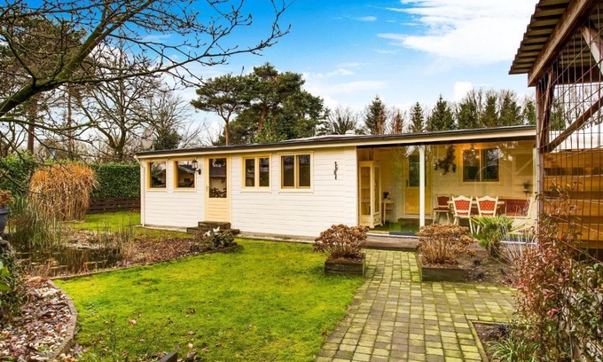 Meerlo House | Welcoming Bungalow in Meerlo with Garden & Fenced Yard