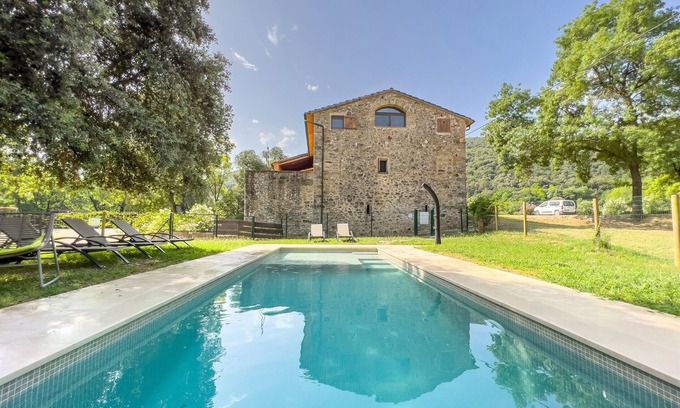 Beguda Apartment | Idyllic Can Blanc Apartment with Pool and Spa Amenities