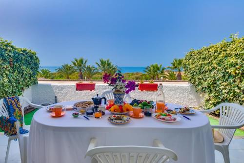 Sciacca Apartment | Idyllic Makauda Beach: Oceanfront Escape with Top Amenities