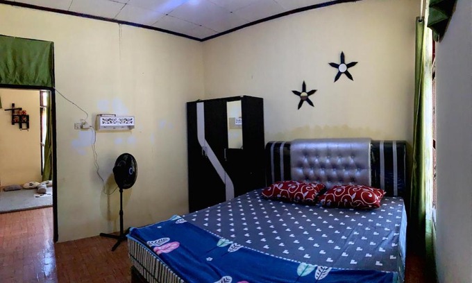 Bukittinggi House | Cozy Malin's Homestay: Family-Friendly Retreat Awaits