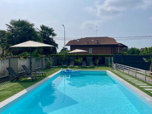 Oleggio Apartment | Cozy Oceanview Retreat at The Grace Place Oleggio
