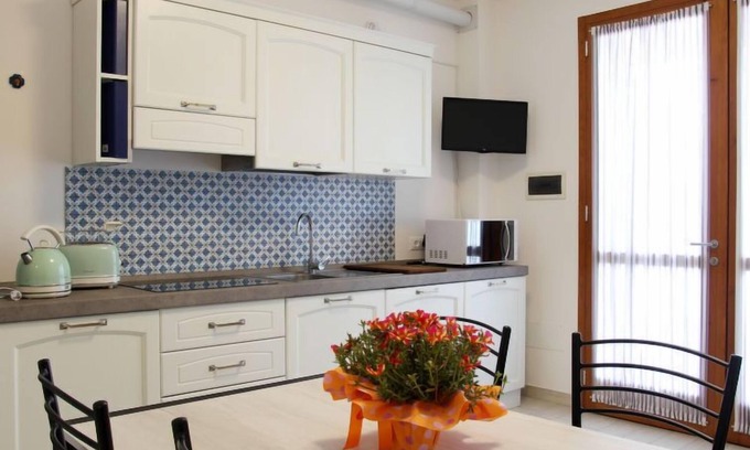 Lido di Volano House | Oceanfront Relaxation at Malva by Interhome