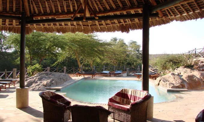 Tsavo Cabin | Explore Man Eaters Lodge: Relaxing Spa & Family-Friendly Fun