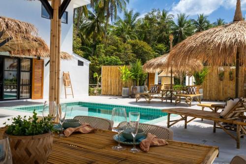 Ko Lanta Villa | Discover Manao Pool Villa: Steps from the Beach & Family-Friendly