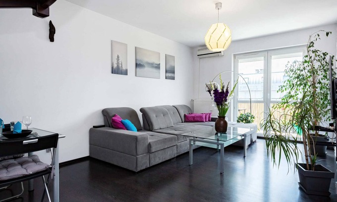 Fabryczna Apartment | Stylish Two-Level Apartment with Terrace and Parking