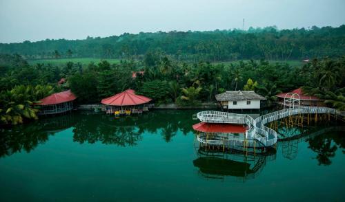Vaikam Resort | Pet-Friendly Retreat at Mango Meadows with Pool & Dining