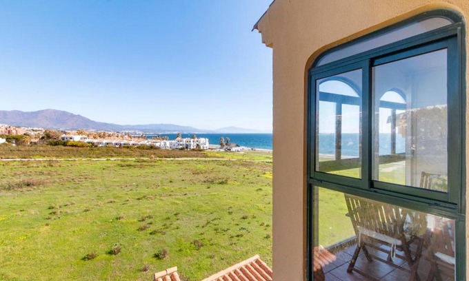 La Chullera Apartment | Discover Manilva Playa: Oceanfront Retreat with Pool Access