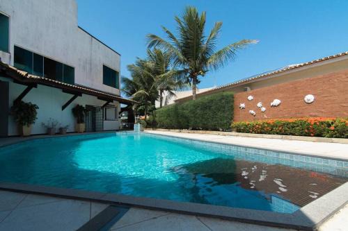 Aruanda House | Elegant Mansão do Refúgio: Oceanfront Bliss & 9.8/10 Rating