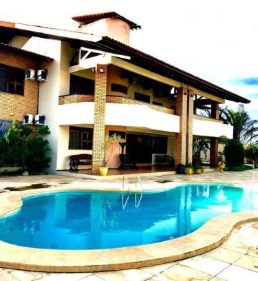 Porto das Dunas House | Mansão Memphis: 10 Suites Steps from the Beach & Park
