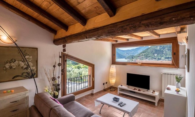 Sulzano Apartment | Lake View Loft with Hot Tub and Family-Friendly Amenities