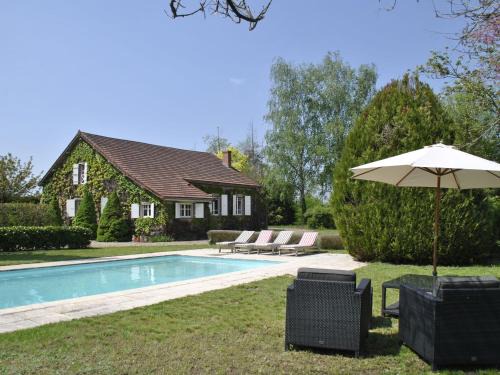Charrin House | Elegant Mansion in Burgundy with Inviting Pool