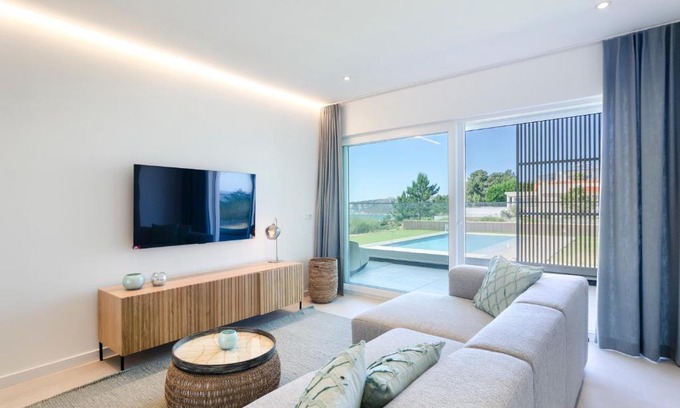 Nazare Apartment | Mar a Vista: Poolside Condo with Gym & Spectacular Sea Views