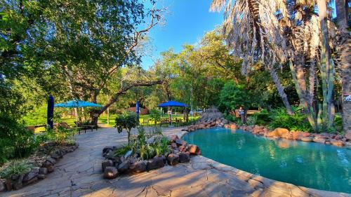 Livingstone Cabin | Experience Comfort at Maramba River Lodge with Ocean Views