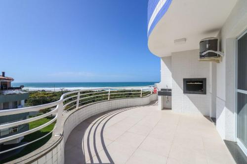 Ingleses Norte Apartment | Elegant Oceanfront Retreat with Spectacular Sea Views