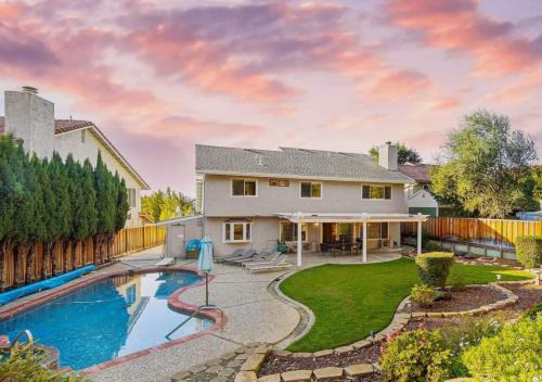 Noble House | Inviting Marbella Lane: 4BR Home with Pool & Family Vibe