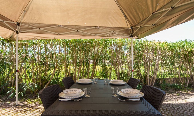San Teodoro City Centre Apartment | Discover Maresole La Cinta: Family-Friendly Getaway