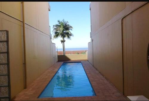 Margate Beach Apartment | Seaview Apartment at Margate Boulevard with Pool Access