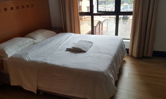 Downtown Kota Kinabalu Apartment | Cozy Marina Court 3-Bedroom Apartment with Pool View