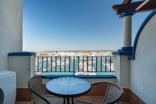 Punta del Moral Apartment | Discover Marina IV by Ĥ: Top-Rated Poolside Retreat