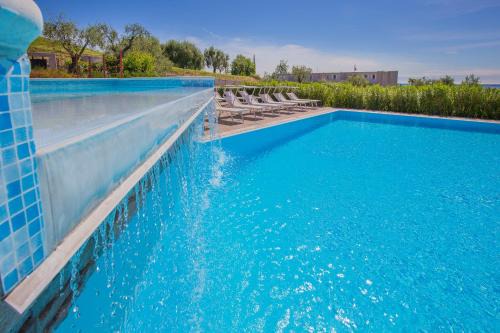 Moniga del Garda House | Coastal Escape at Marina Loft with Ocean Views & Pool