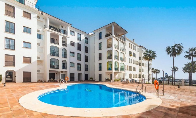 Castillo de Sabinillas Apartment | Discover Marina Real 321: Family-Friendly with Pool Access