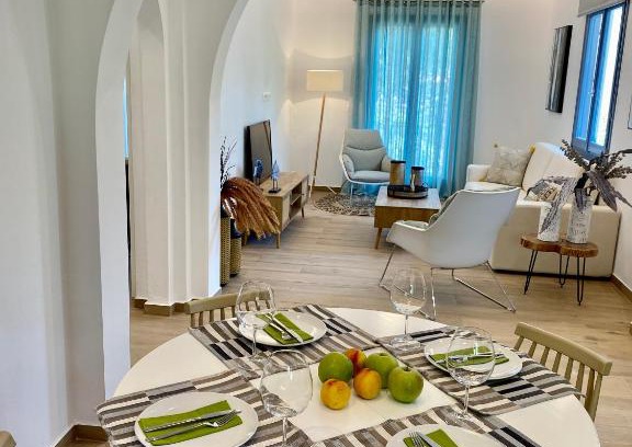 Votsi Apartment | Oceanfront Retreat: Marine's Home with Stunning Views