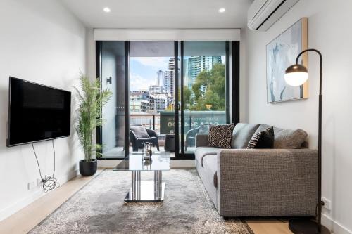 West Melbourne Apartment | Modern Vintage Pad by Factory Outlets - Family-Friendly Stay