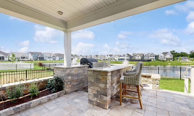 Cedar Neck House | Marlin Chase home with resort amenities, patio, grill, balcony & pool